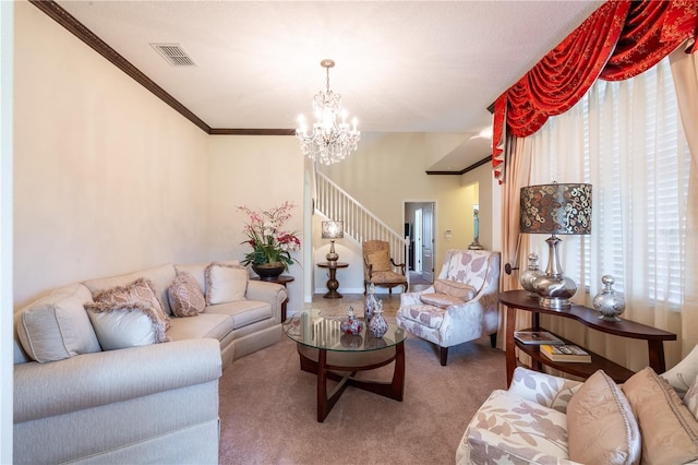 living room featuring carpet flooring, a chandelier, and ornamental molding