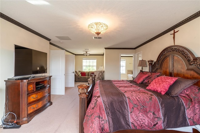 bedroom featuring crown molding and light colored carpet