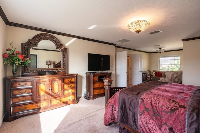 carpeted bedroom featuring ornamental molding and a textured ceiling