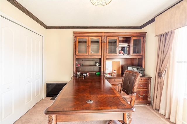 office area featuring light colored carpet and ornamental molding