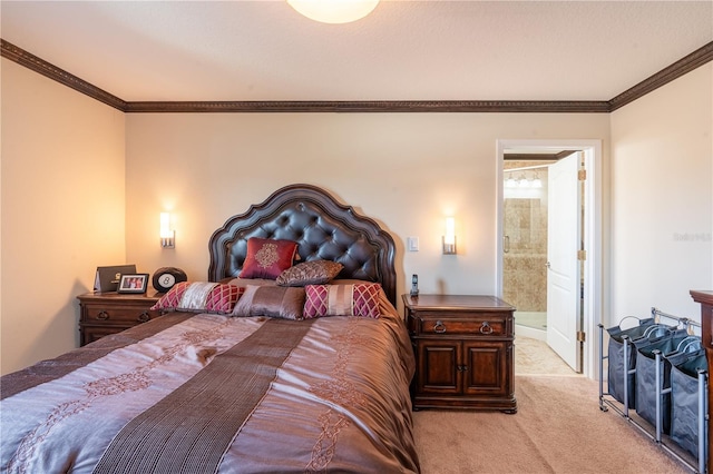 carpeted bedroom featuring ensuite bathroom and ornamental molding