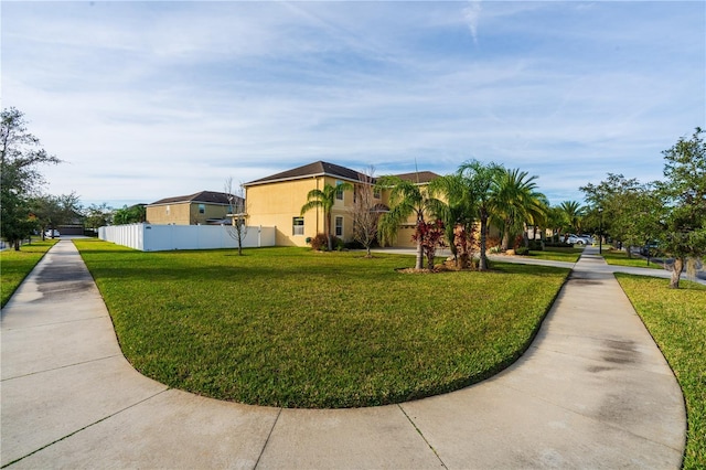 view of property exterior with a lawn