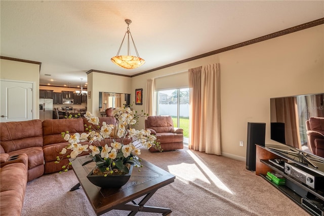 living room featuring ornamental molding, light colored carpet, and an inviting chandelier