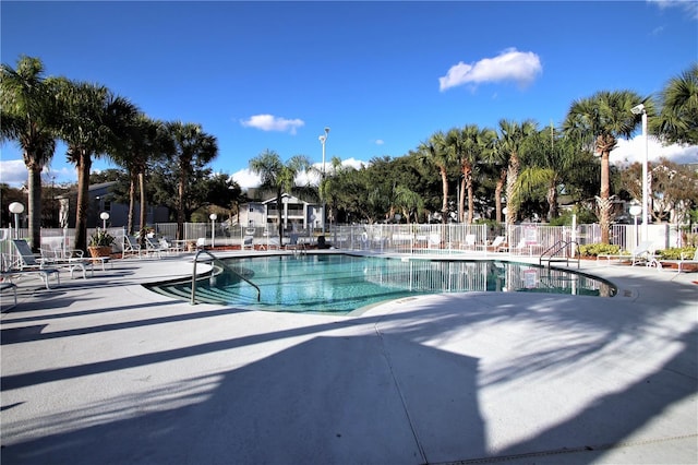 view of pool featuring a patio