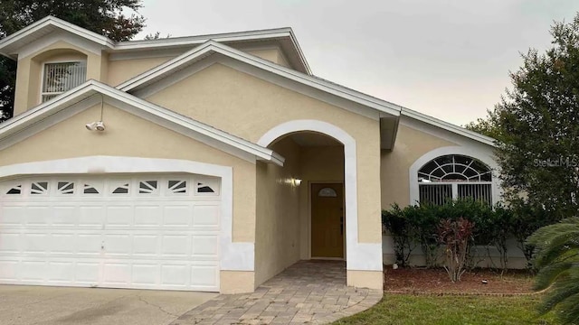 single story home with a garage