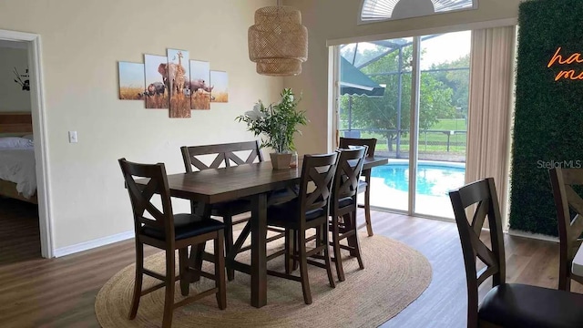 dining room with hardwood / wood-style floors