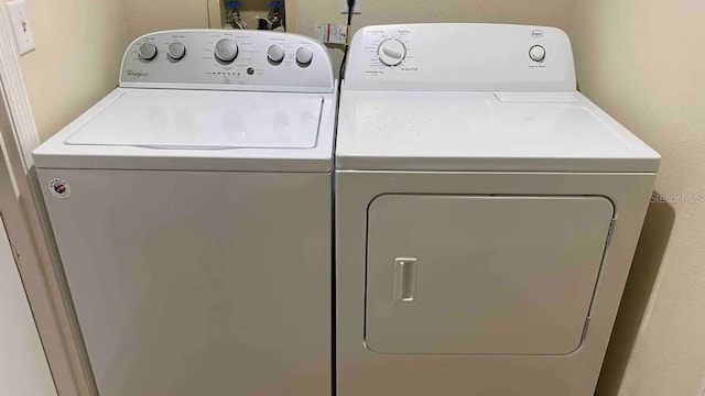 laundry area featuring separate washer and dryer