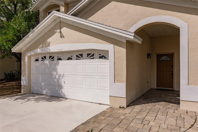 garage featuring driveway