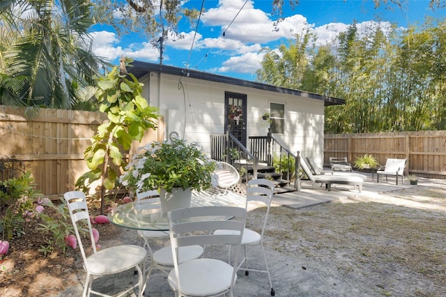 back of house featuring a patio