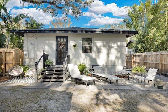 rear view of house with a patio area