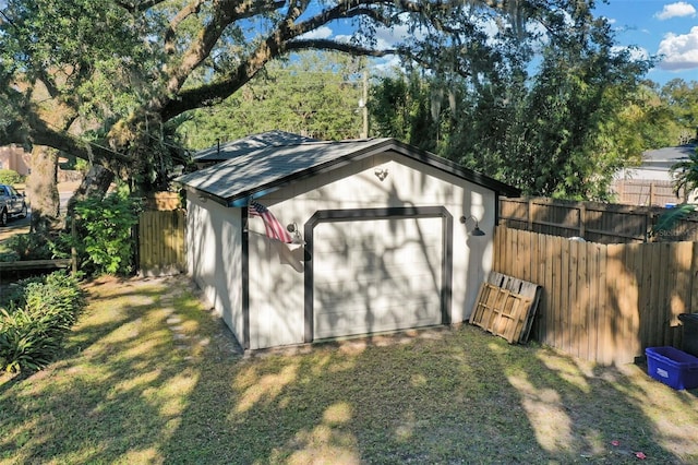 view of outdoor structure featuring a yard