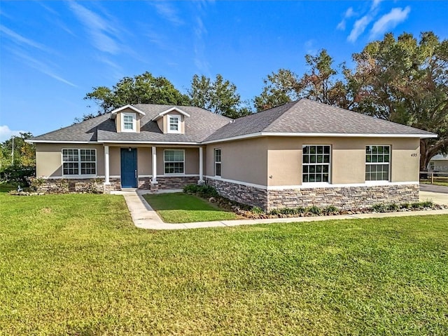 view of front facade with a front yard