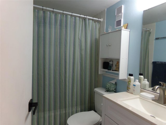 full bathroom featuring vanity, shower / bath combination with curtain, and toilet