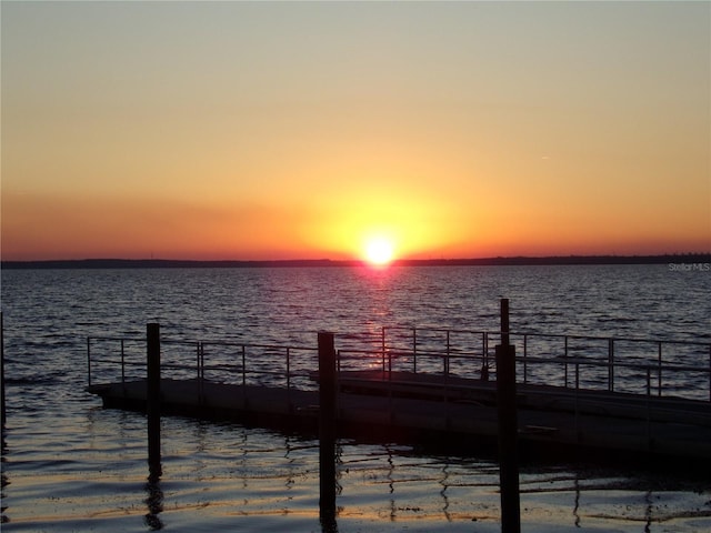 view of dock with a water view