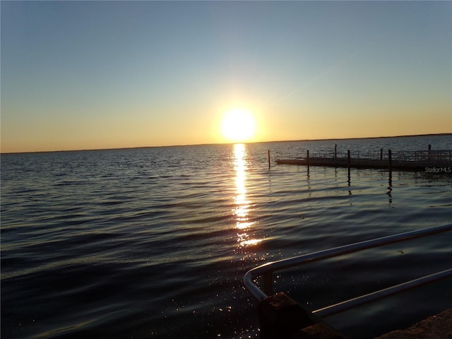 property view of water with a boat dock