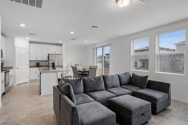 tiled living room with sink