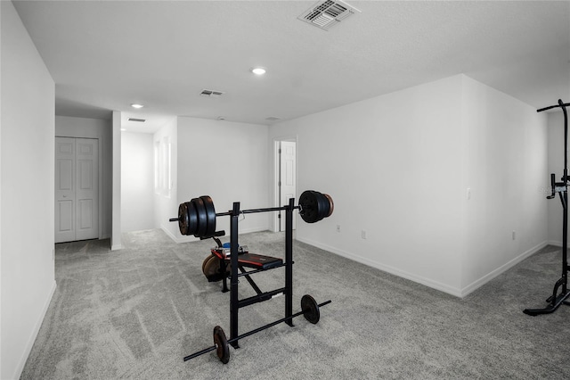 exercise area with light carpet