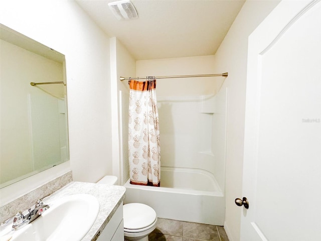 full bathroom with tile patterned floors, vanity, shower / bath combo, and toilet