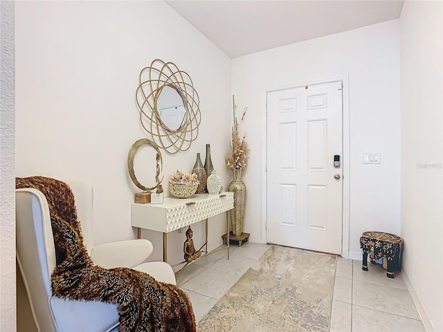 entryway featuring light tile patterned flooring