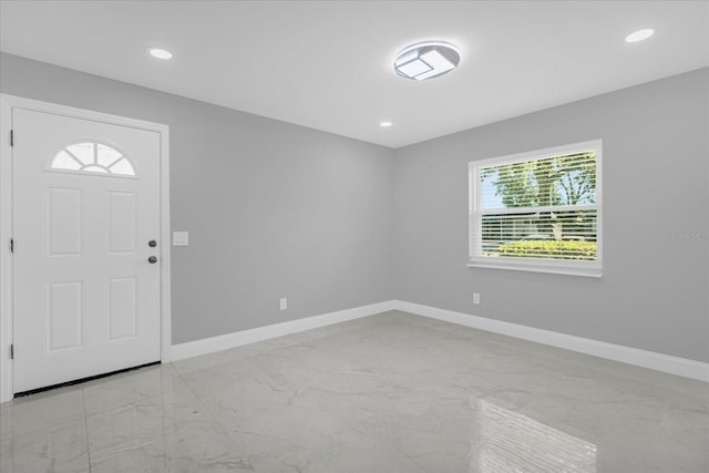 foyer entrance featuring plenty of natural light