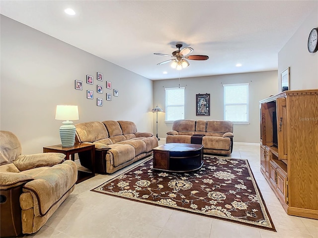 tiled living room featuring ceiling fan