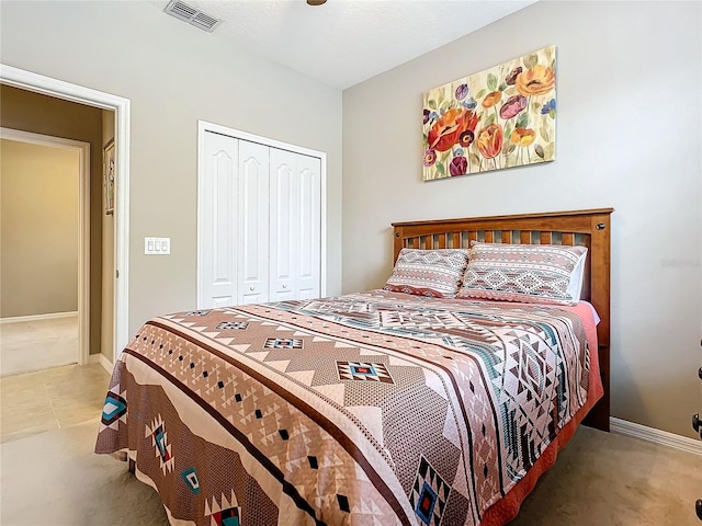 bedroom featuring carpet and a closet