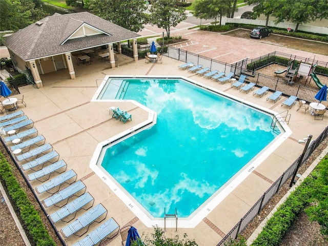 view of swimming pool featuring a patio