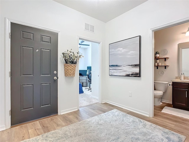 entrance foyer featuring light hardwood / wood-style floors