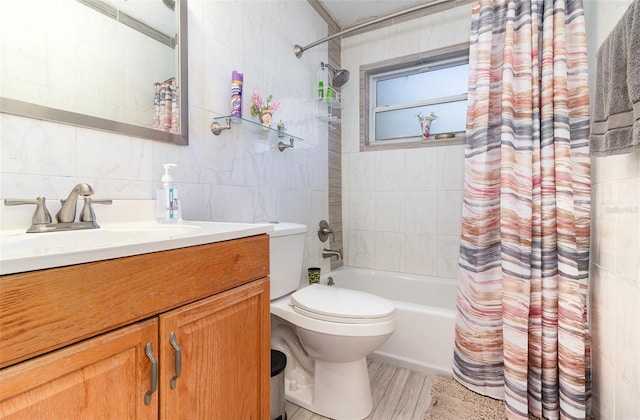 full bathroom featuring vanity, toilet, tile walls, and shower / tub combo with curtain