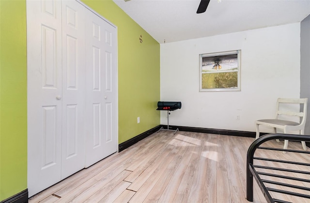 unfurnished room featuring ceiling fan and light hardwood / wood-style flooring