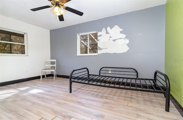 interior space featuring ceiling fan and light hardwood / wood-style flooring