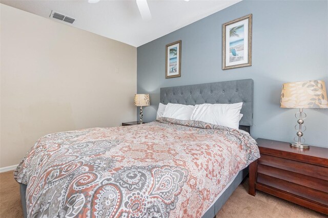 carpeted bedroom featuring ceiling fan