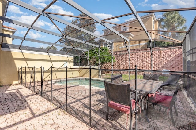 view of patio / terrace with a fenced in pool and a lanai