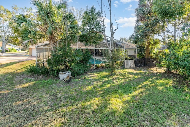 view of yard featuring a lanai