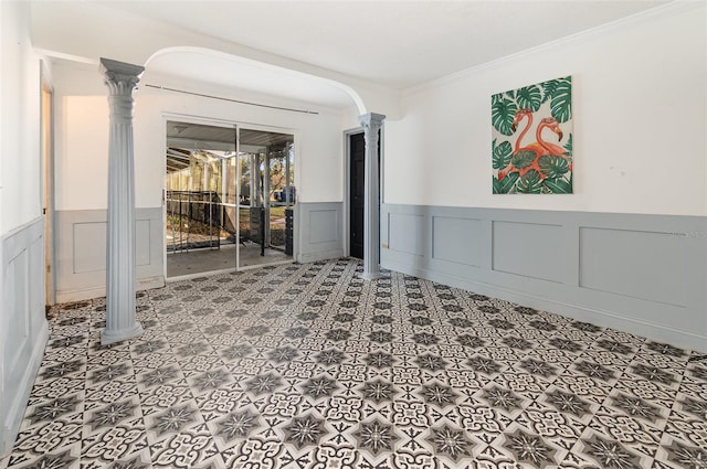 empty room featuring ornamental molding