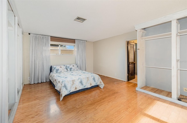 bedroom featuring hardwood / wood-style floors