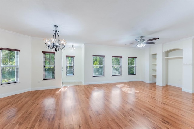 unfurnished living room featuring ceiling fan with notable chandelier, light hardwood / wood-style floors, built in features, and ornamental molding