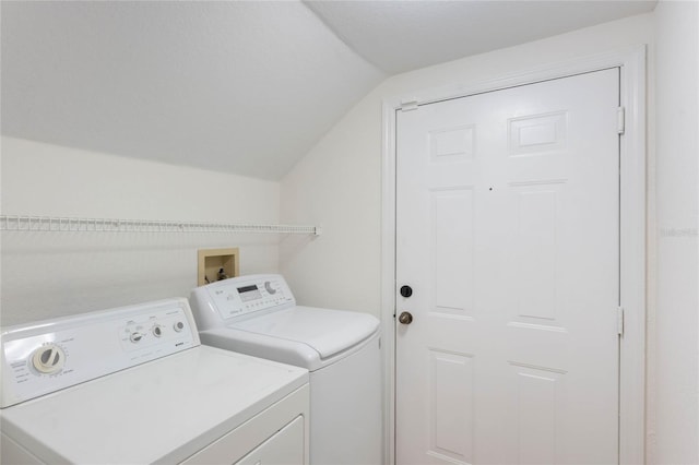 clothes washing area featuring washing machine and dryer