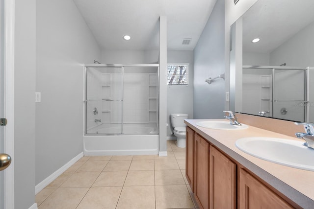 full bath with tile patterned floors, toilet, visible vents, and a sink