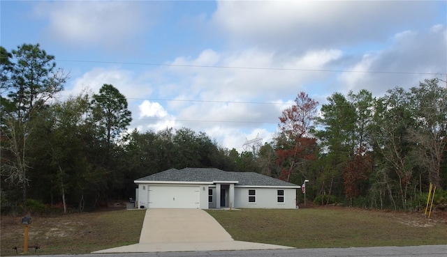 ranch-style home with a front yard and a garage