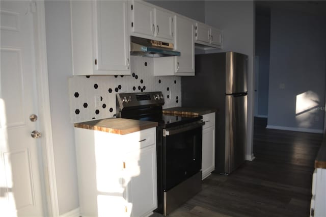 kitchen featuring tasteful backsplash, wooden counters, dark hardwood / wood-style floors, white cabinetry, and appliances with stainless steel finishes