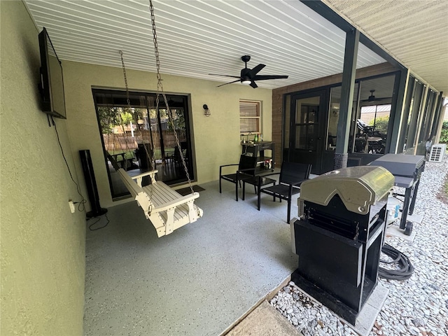 view of patio featuring ceiling fan and a grill