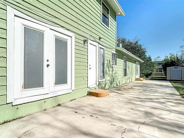 view of side of home featuring a patio