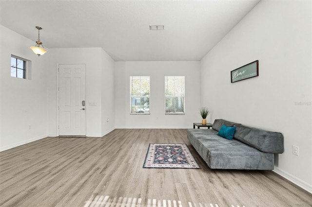 sitting room featuring light hardwood / wood-style flooring