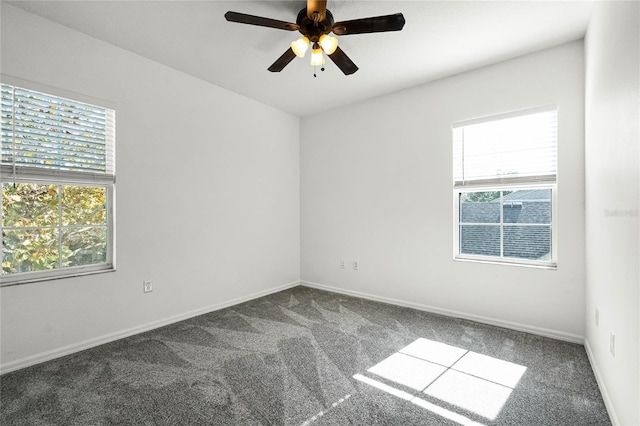 empty room with carpet floors and ceiling fan