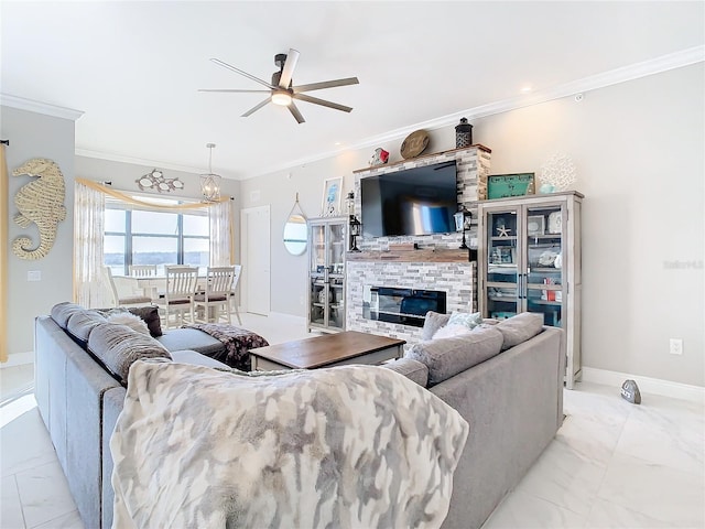 living room with ceiling fan and crown molding