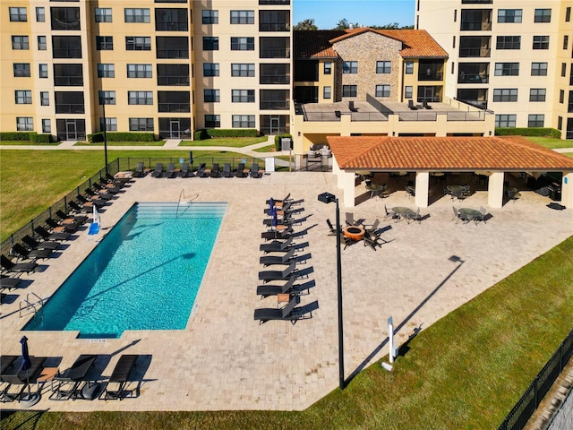 view of swimming pool with a patio