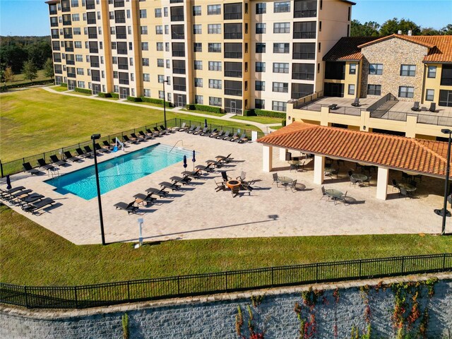 view of swimming pool with a lawn, a gazebo, and a patio