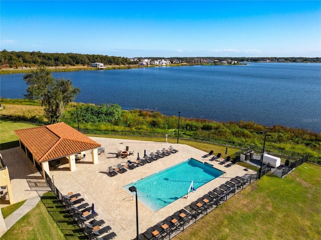 view of pool with a gazebo and a water view