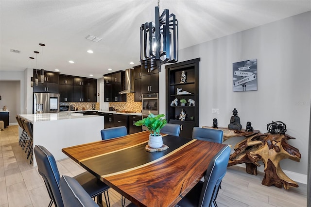 dining room featuring light hardwood / wood-style flooring